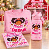 Close-up of Sugar Plum personalized pink sweatshirt, Dream tumbler, and Dream's Sugar Plum Adventures coloring book