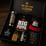 Gift set with 'Big Poppa' themed items including tumbler, shirt, and cap in a box.
