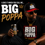 Man wearing a 'BIG POPPA' shirt and cap, holding a matching mug with text.