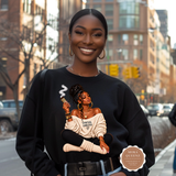 A woman stands on a city street wearing a black crewneck sweatshirt with a large graphic print of a woman smoking and the text 'SPECIAL GANGSTER'.