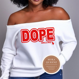 White off-shoulder sweatshirt with 'DOPE' text and Moka Queenz logo on a gray background