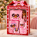 Dream's Sugar Plum Christmas gift box with pink personalized sweatshirt, tumbler, coloring book, crayons, reindeer plush, socks, and Santa note