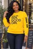 A woman wearing a bright yellow crewneck sweatshirt with black text reading 'SPECIAL GIRL.