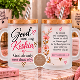 Two frosted glass mugs with bamboo lids and clear straws, displayed side by side on a marble surface. The left mug reads 'Good morning Keshia, God already went ahead of you' with pink and black text and small heart accents.