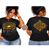 A black short-sleeve graphic T-shirt shown on a model from both front and back views. The front features the word 'JODECI' in large gold letters over a printed band photo, and the back has a large gold diamond-shaped 'JODECI' logo.