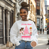 Woman wearing a white sweatshirt with a Christmas design on a city street
