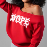 Red sweatshirt with 'DOPE SINCE 1913' text worn by a person on a gray background