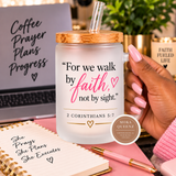 A frosted glass tumbler with a bamboo lid and clear straw, held by a hand with pink manicured nails. The tumbler features the Bible verse 'For we walk by faith, not by sight.