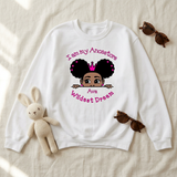 White I Am My Ancestors Wildest Dream girls sweatshirt flat lay with a stuffed bunny and sunglasses