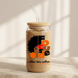 Focused iced coffee glass on a pale stone surface