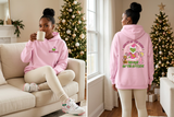 Light pink Grinchmas hoodie front-and-back lifestyle views with coordinated sneakers and hot cocoa.