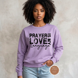 Prayer Is My Love Language sweatshirt in lavender with distressed black typography, modeled
