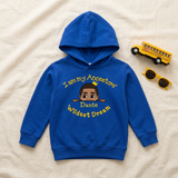 Royal blue I Am My Ancestors Wildest Dream toddler hoodie flat lay with a toy school bus and sunglasses