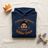 Navy I Am My Ancestors Wildest Dream boys hoodie flat lay with a toy crown and wooden airplane