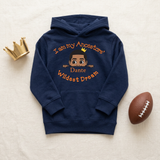 Navy I Am My Ancestors Wildest Dream toddler hoodie flat lay with a gold toy crown and football