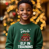 Kids green personalized Christmas sweatshirt with the name Dante and a peeking elf boy above the words Elf in Training