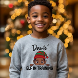 Big kid sport gray personalized Christmas sweatshirt with the name Dante above the words Elf in Training