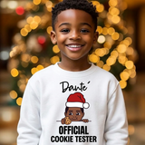 Kids personalized Christmas sweatshirt with the name Dante and a peeking boy with a cookie above the words Official Cookie Tester