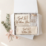 God Is Within Her gift box with the matching shirt, frosted can cup, and tote in a white box with eucalyptus, styled for year-round gifting