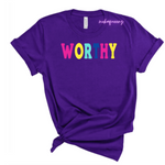 Worthy T-Shirt - Purple t shirt with pink, yellow, mint green, and royal blue text 